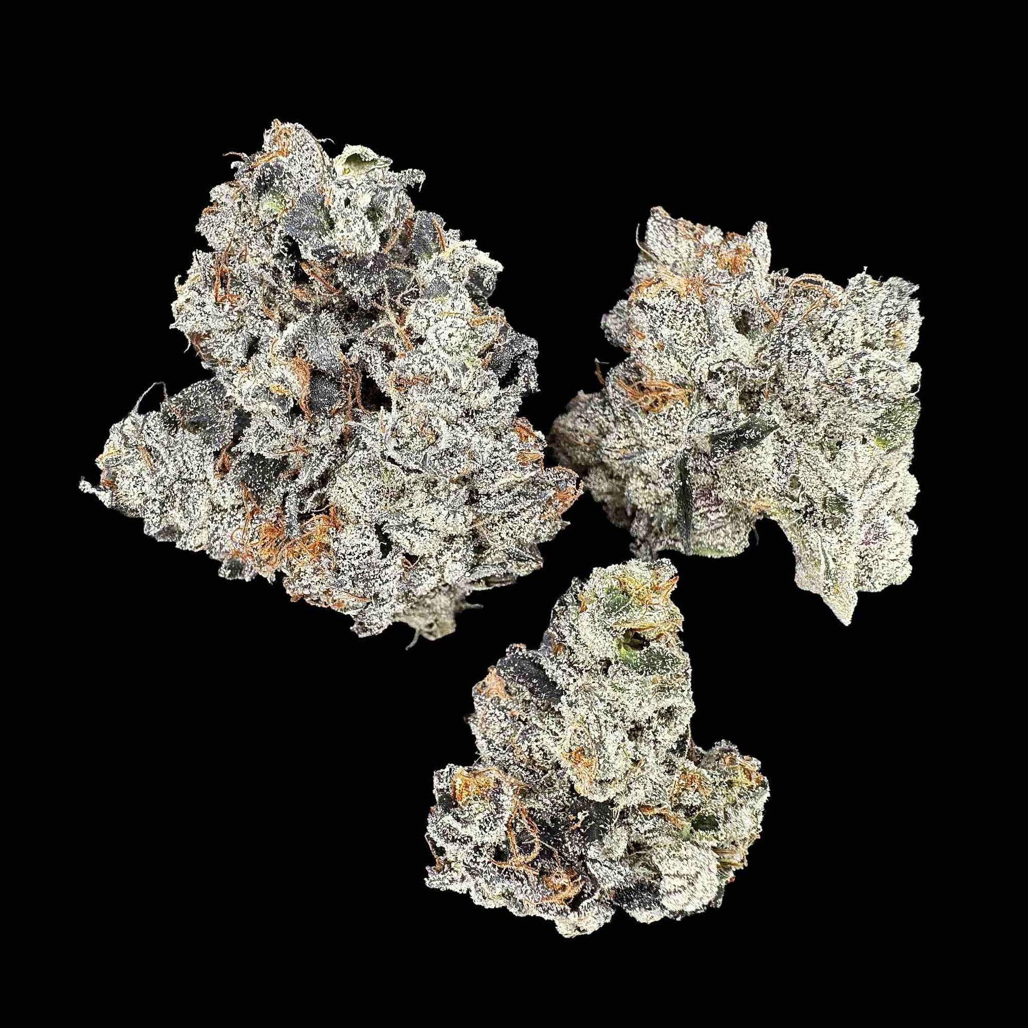 Close up of three high thca dried buds of premium top shelf legal weed hemp flower with potent crystals and high terpenes on a black background. The strain is Goofiez. It has a gassy loud sour diesel style nose.